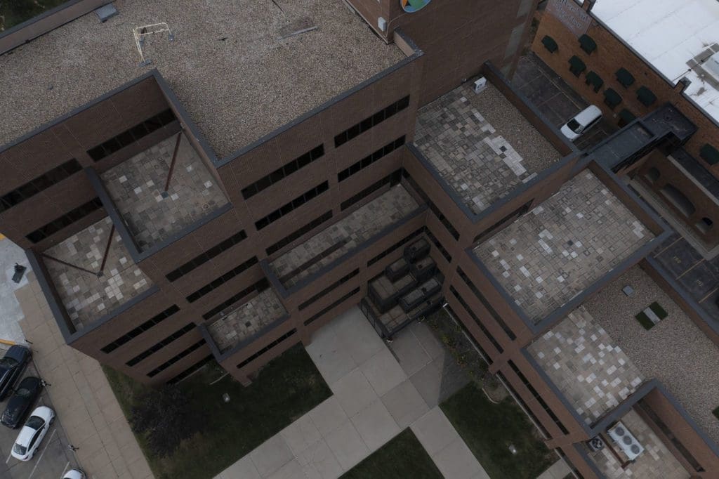 Commercial building flat roof downtown rapid city sd Weather Tite Exteriors