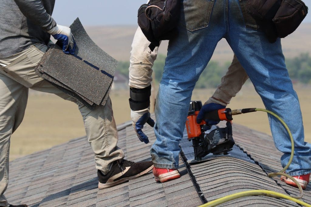 Roofer repairing a roof in Rapid City SD Weather Tite Exteriors