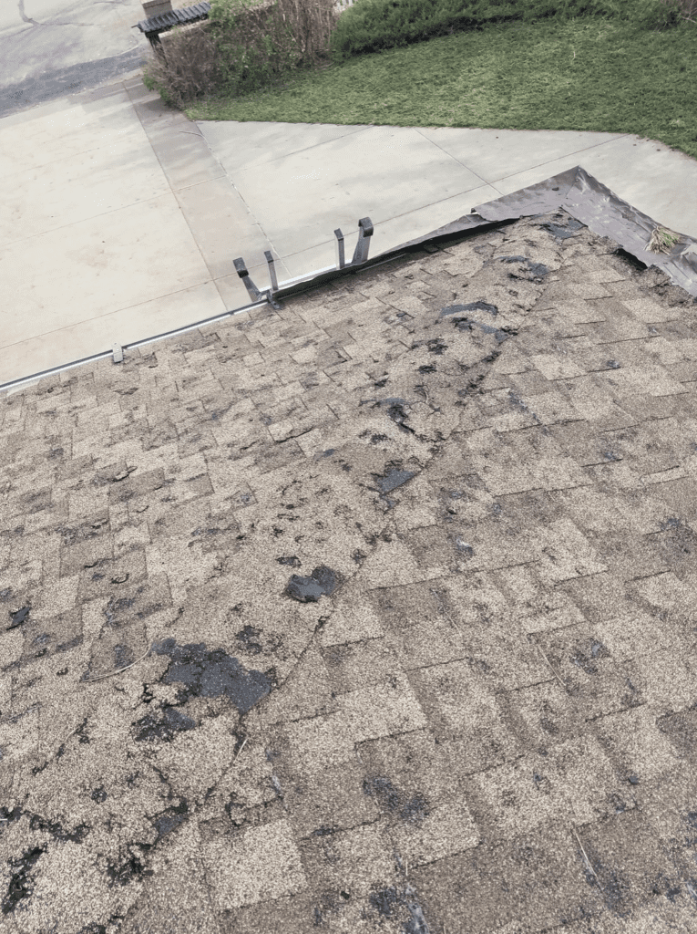 Hail damage to asphalt shingle rapid city sd weather tite exteriors