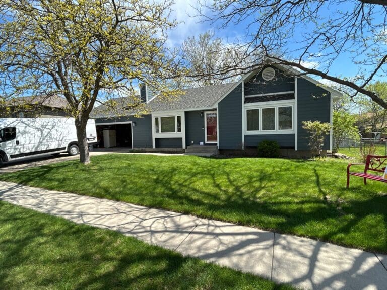 New dark blue siding on home in Rapid City.